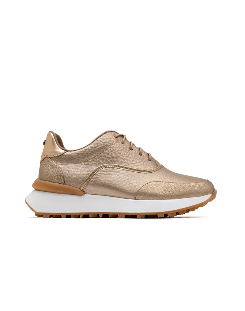 Deportivo en cuero sofisticado en color Dorado