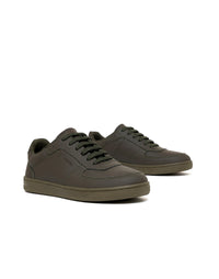 Zapato deportivo de cuero para hombre color verde.