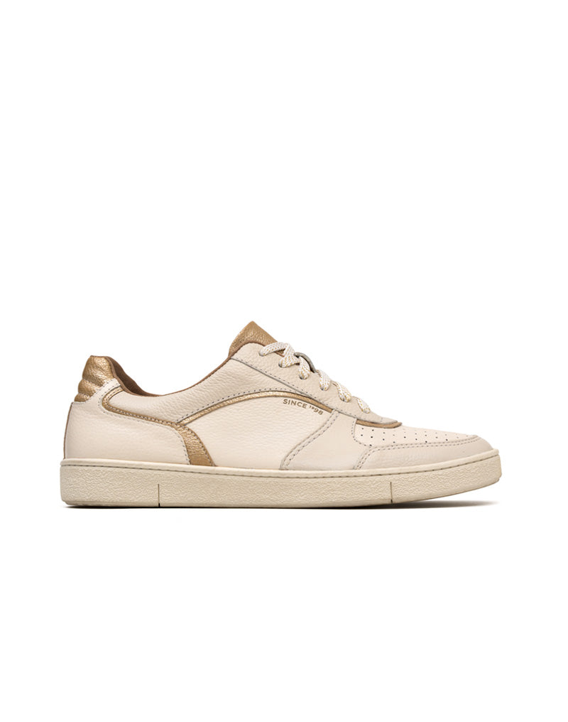Deportivo en cuero silueta minimalista y moderna, para mujer color beige