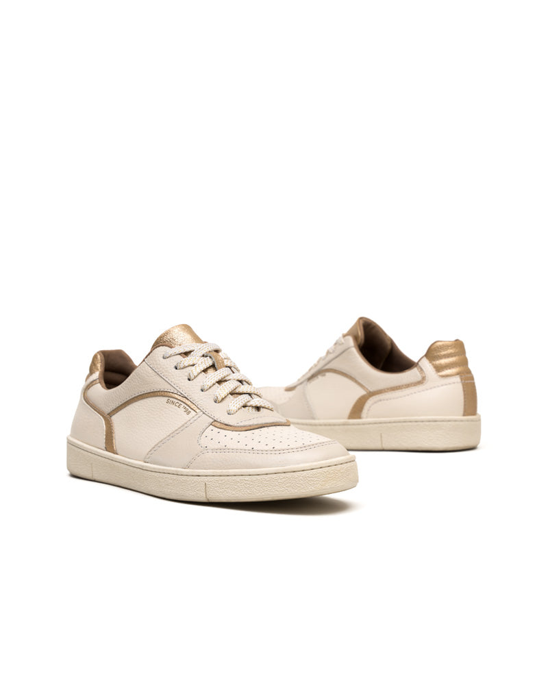 Deportivo en cuero silueta minimalista y moderna, para mujer color beige