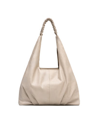 Bolsa elegante en cuero suave para dama color beige.