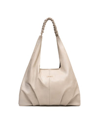 Bolsa elegante en cuero suave para dama color beige.