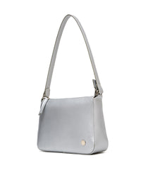 Bolso manos libres en cuero para dama color plateado